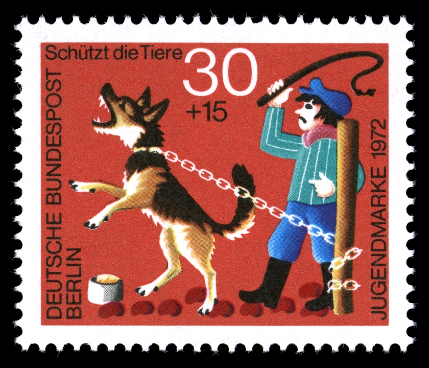 German postage stamp showing man beating chained dog